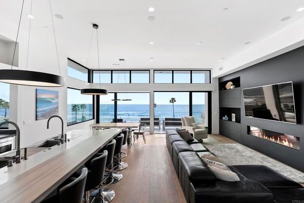 Dining room, Fireplace, Interior, Kitchen, Living room, Pendant Lights, Recessed Lighting, Water, Wood Texture Flooring