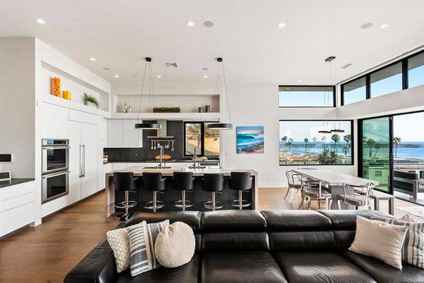 Dining room, Interior, Kitchen, Living room, Pendant Lights, Recessed Lighting, Stainless Steel Appliances, Water, Wood Texture Flooring