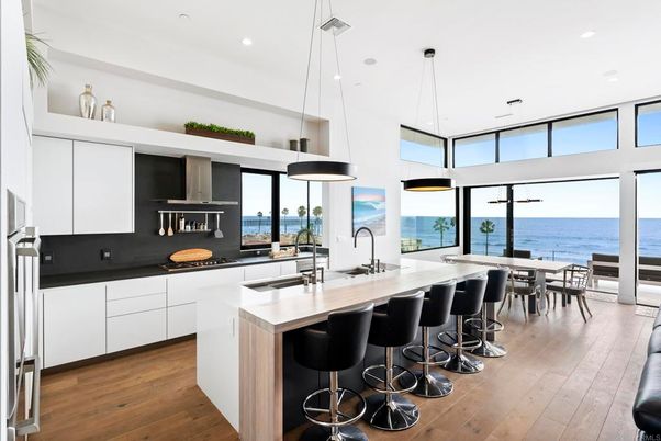 Dining room, Interior, Kitchen, Pendant Lights, Recessed Lighting, Stainless Steel Appliances, Water, Wood Texture Flooring