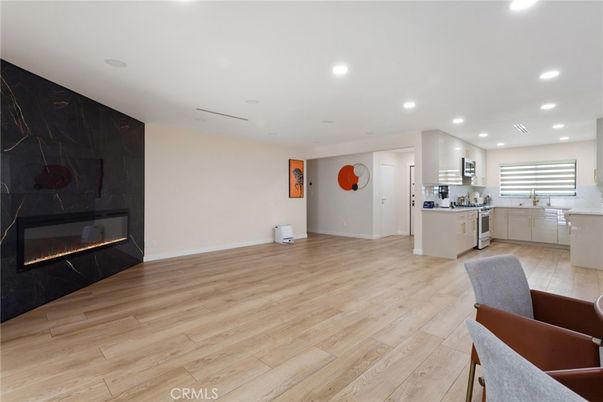 Fireplace, Interior, Kitchen, Recessed Lighting, Wood Texture Flooring