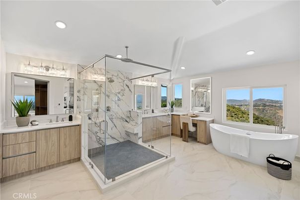 Bathroom, Dual Sink Vanities, Free Standing Baths, Glass Shower, Interior, Marble, Marble Walls, Recessed Lighting
