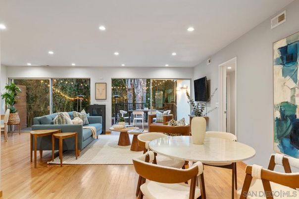 Dining room, Fireplace, Interior, Living room, Recessed Lighting, Wood Texture Flooring