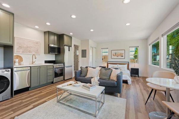 Dining room, Interior, Kitchen, Living room, Recessed Lighting, Stainless Steel Appliances, Wood Texture Flooring