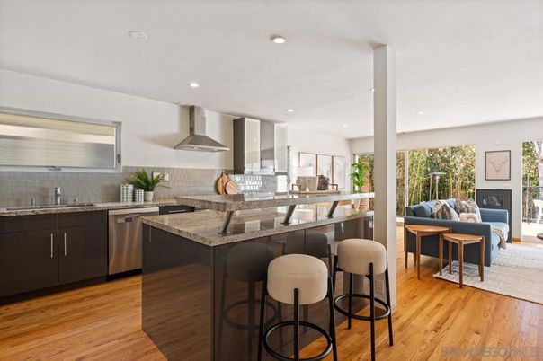 Fireplace, Interior, Kitchen, Living room, Recessed Lighting, Stainless Steel Appliances, Wood Texture Flooring