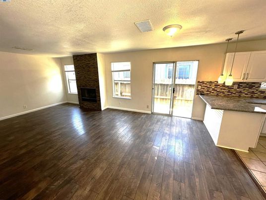 Empty room, Fireplace, Interior, Pendant Lights, Wood Texture Flooring