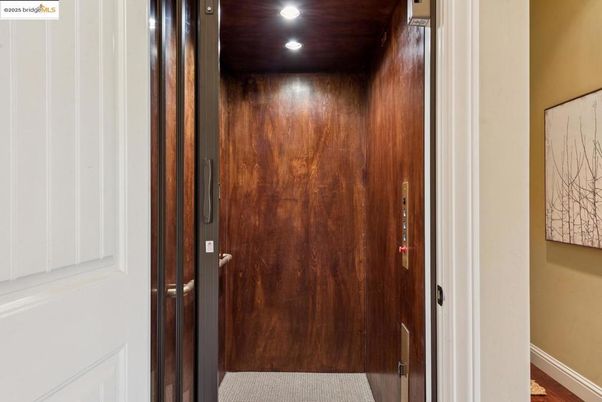 Elevator, Interior, Recessed Lighting, Wooden Ceilings, Wooden Walls
