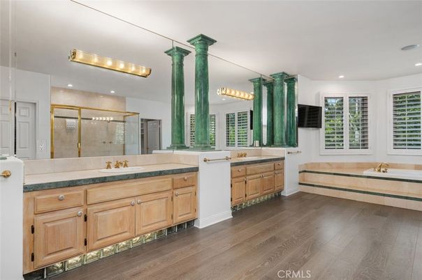 Bathroom, Dual Sink Vanities, Glass Shower, Interior, Recessed Lighting, Wood Texture Flooring