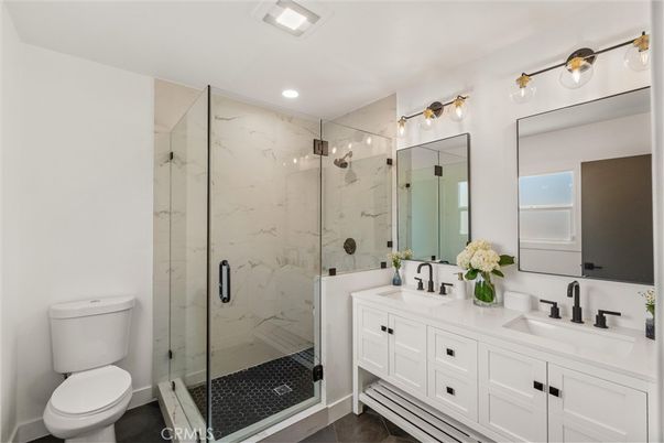Bathroom, Dual Sink Vanities, Glass Shower, Interior, Marble Walls, Recessed Lighting