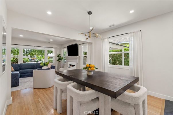 Dining room, Fireplace, Interior, Living room, Pendant Lights, Recessed Lighting, Wood Texture Flooring
