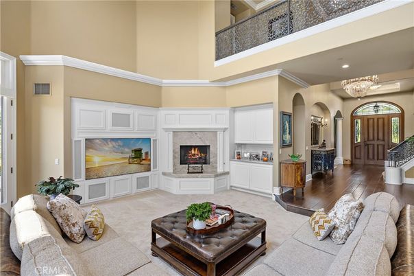 Chandelier, Fireplace, Interior, Living room, Recessed Lighting, Wood Texture Flooring