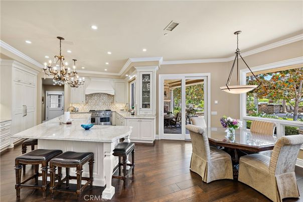 Chandelier, Dining room, Fireplace, Interior, Kitchen, Pendant Lights, Recessed Lighting, Wood Texture Flooring