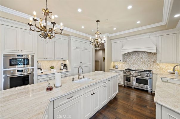 Chandelier, Interior, Kitchen, Recessed Lighting, Stainless Steel Appliances, Wood Texture Flooring