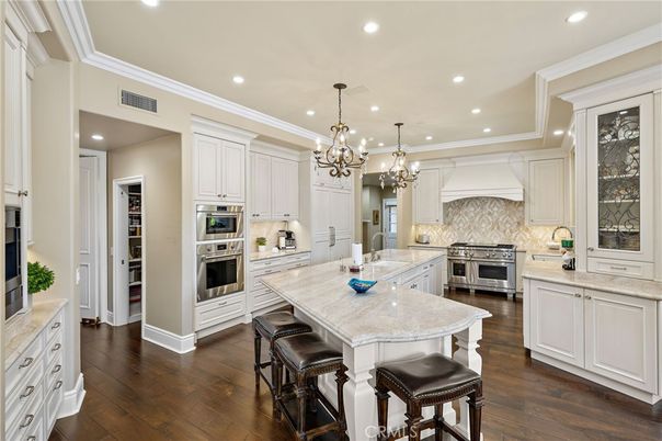 Chandelier, Interior, Kitchen, Recessed Lighting, Stainless Steel Appliances, Wood Texture Flooring