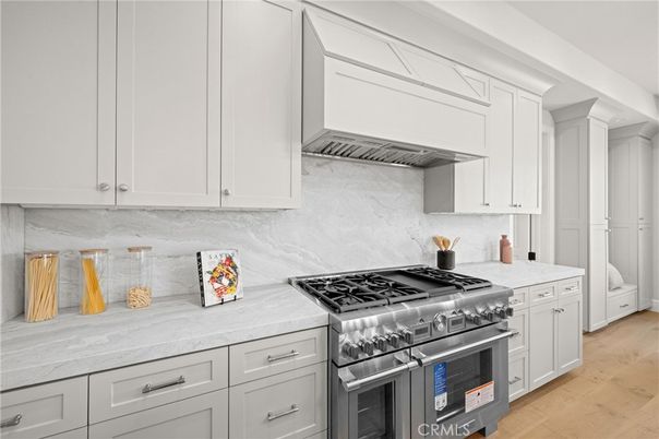 Interior, Kitchen, Marble Walls, Stainless Steel Appliances, Wood Texture Flooring