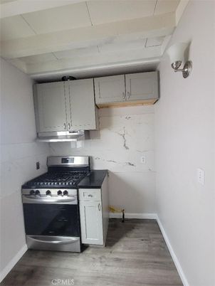 Interior, Kitchen, Marble Walls, Stainless Steel Appliances, Wood Texture Flooring