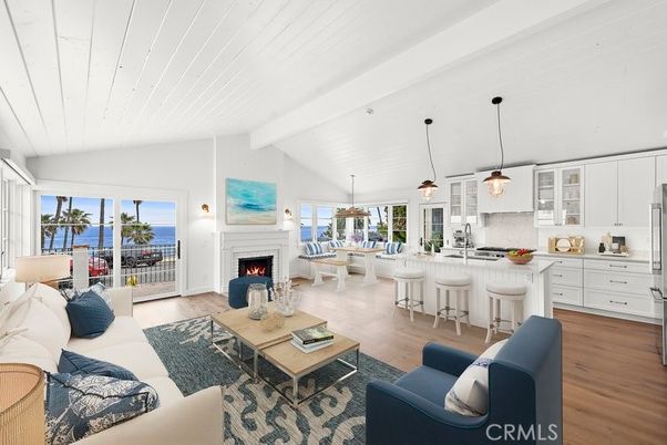 Dining room, Fireplace, Interior, Kitchen, Living room, Pendant Lights, Water, Wood Texture Flooring