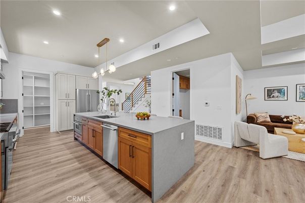 Interior, Kitchen, Pendant Lights, Recessed Lighting, Stainless Steel Appliances, Wood Texture Flooring