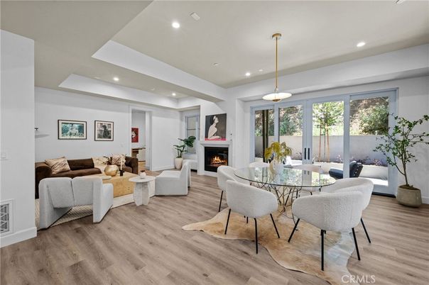 Dining room, Fireplace, Interior, Living room, Pendant Lights, Recessed Lighting, Wood Texture Flooring