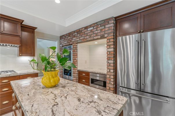 Interior, Kitchen, Recessed Lighting, Stainless Steel Appliances, Stone Walls
