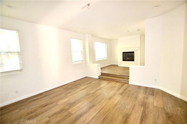 Empty room, Fireplace, Interior, Recessed Lighting, Wood Texture Flooring