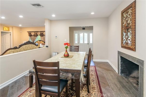 Dining room, Fireplace, Interior, Recessed Lighting, Wood Texture Flooring