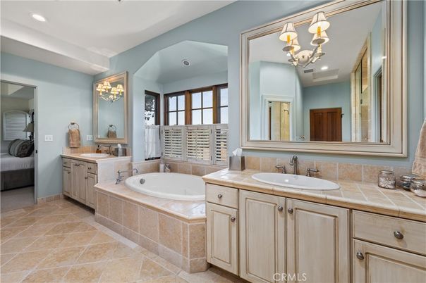 Bathroom, Dual Sink Vanities, Interior, Recessed Lighting, Tile Countertops
