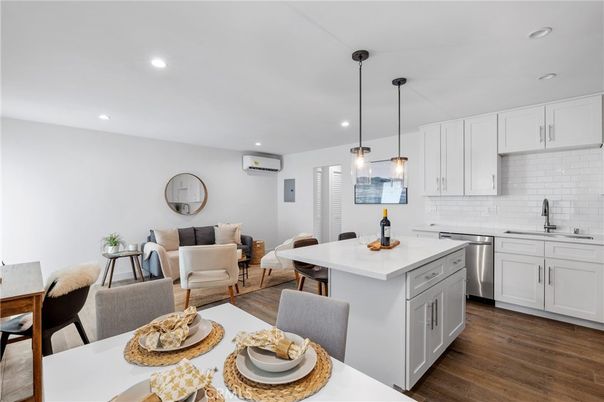 Dining room, Interior, Kitchen, Living room, Pendant Lights, Recessed Lighting, Stainless Steel Appliances, Wood Texture Flooring
