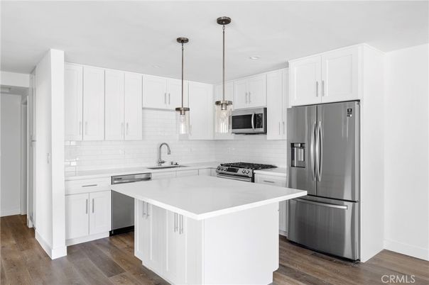 Interior, Kitchen, Pendant Lights, Recessed Lighting, Stainless Steel Appliances, Wood Texture Flooring