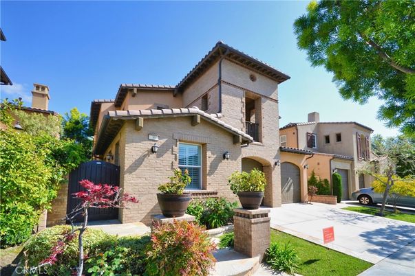 Attached, Exterior, Facade, Brick Facade, Mediterranean