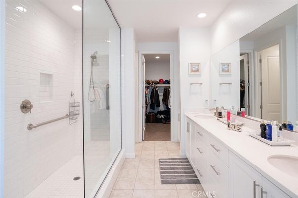 Bathroom, Dual Sink Vanities, Glass Shower, Interior, Recessed Lighting, Walk-in Closets