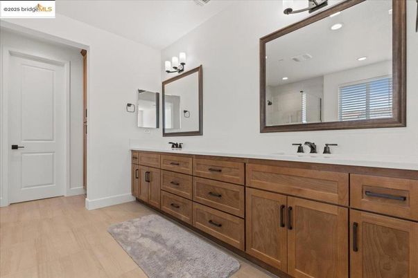 Bathroom, Dual Sink Vanities, Interior, Recessed Lighting, Wood Texture Flooring