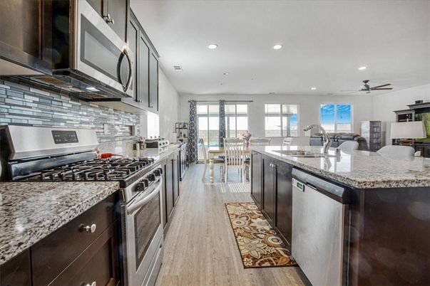 Dining room, Interior, Kitchen, Recessed Lighting, Stainless Steel Appliances, Wood Texture Flooring