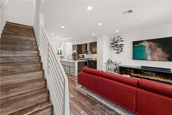 Fireplace, Interior, Kitchen, Living room, Recessed Lighting, Wood Texture Flooring