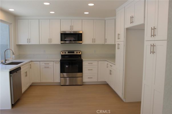 Interior, Kitchen, Recessed Lighting, Stainless Steel Appliances, Wood Texture Flooring