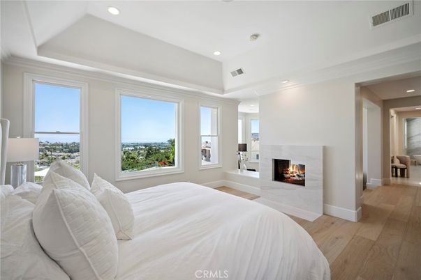 Bedroom, Fireplace, Interior, Recessed Lighting, Wood Texture Flooring