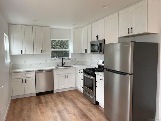 Interior, Kitchen, Recessed Lighting, Stainless Steel Appliances, Wood Texture Flooring