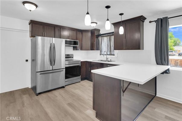 Interior, Kitchen, Pendant Lights, Stainless Steel Appliances, Wood Texture Flooring
