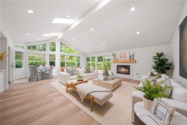 Dining room, Fireplace, Interior, Living room, Recessed Lighting, Wood Texture Flooring