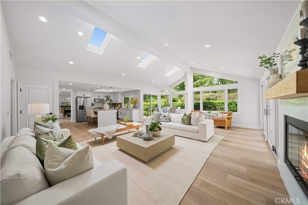 Fireplace, Interior, Kitchen, Living room, Recessed Lighting, Stainless Steel Appliances, Wood Texture Flooring