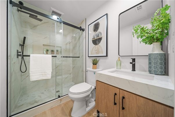 Bathroom, Glass Shower, Interior, Marble Walls, Wood Texture Flooring
