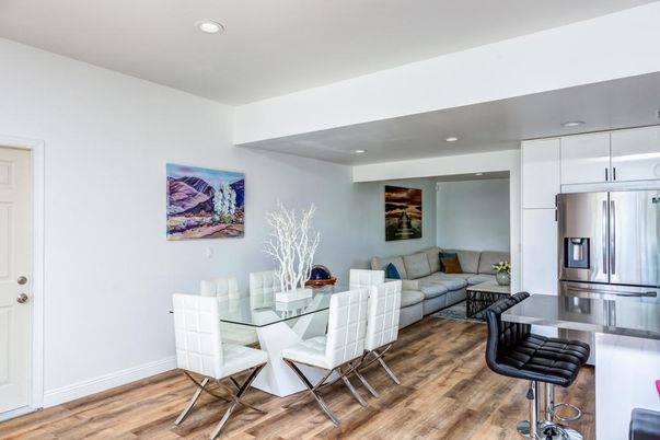 Dining room, Interior, Kitchen, Living room, Recessed Lighting, Stainless Steel Appliances, Wood Texture Flooring