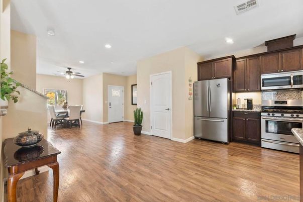 Dining room, Interior, Kitchen, Recessed Lighting, Stainless Steel Appliances, Wood Texture Flooring