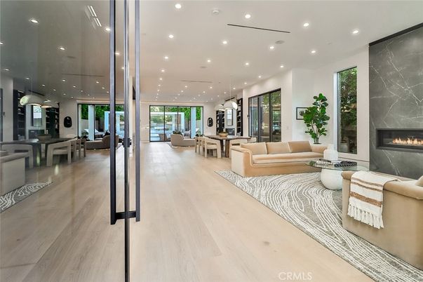 Dining room, Fireplace, Interior, Living room, Pendant Lights, Recessed Lighting, Wood Texture Flooring