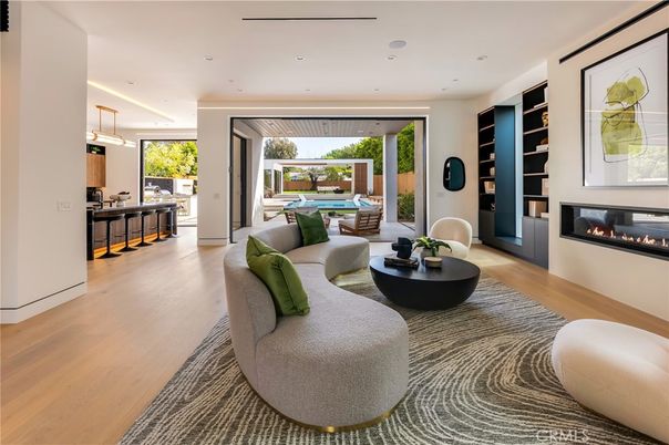 Billiard Table, Fireplace, Game Room, Interior, Living room, Pendant Lights, Recessed Lighting, Wood Texture Flooring