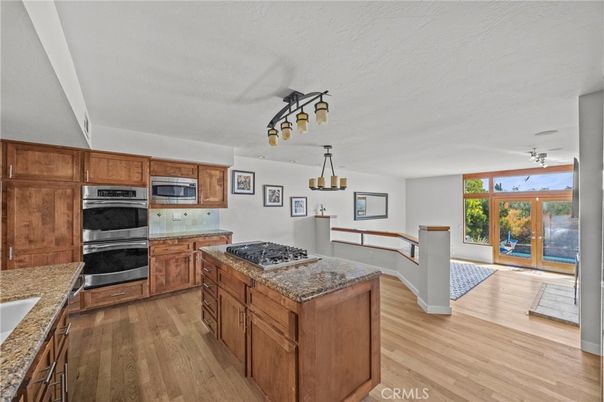 Interior, Kitchen, Pendant Lights, Stainless Steel Appliances, Wood Texture Flooring
