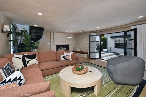 Dining room, Fireplace, Interior, Living room, Pendant Lights, Recessed Lighting, Stone Walls, Wood Texture Flooring