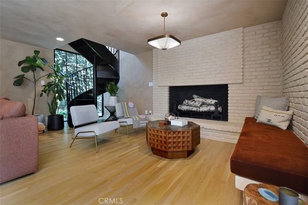 Fireplace, Interior, Living room, Pendant Lights, Recessed Lighting, Stone Walls, Wood Texture Flooring