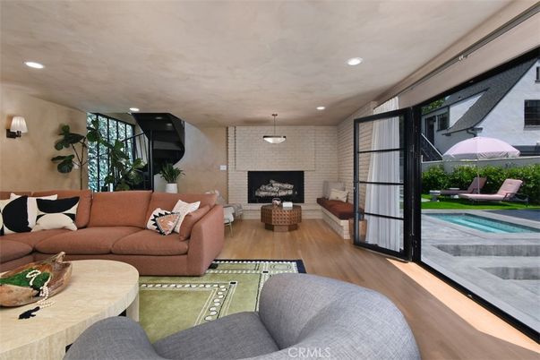 Fireplace, Interior, Living room, Pendant Lights, Recessed Lighting, Stone Walls, Wood Texture Flooring