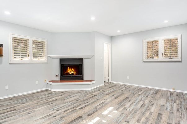 Empty room, Fireplace, Interior, Recessed Lighting, Wood Texture Flooring