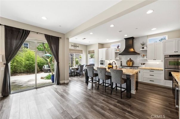 Dining room, Interior, Kitchen, Recessed Lighting, Stainless Steel Appliances, Wood Texture Flooring